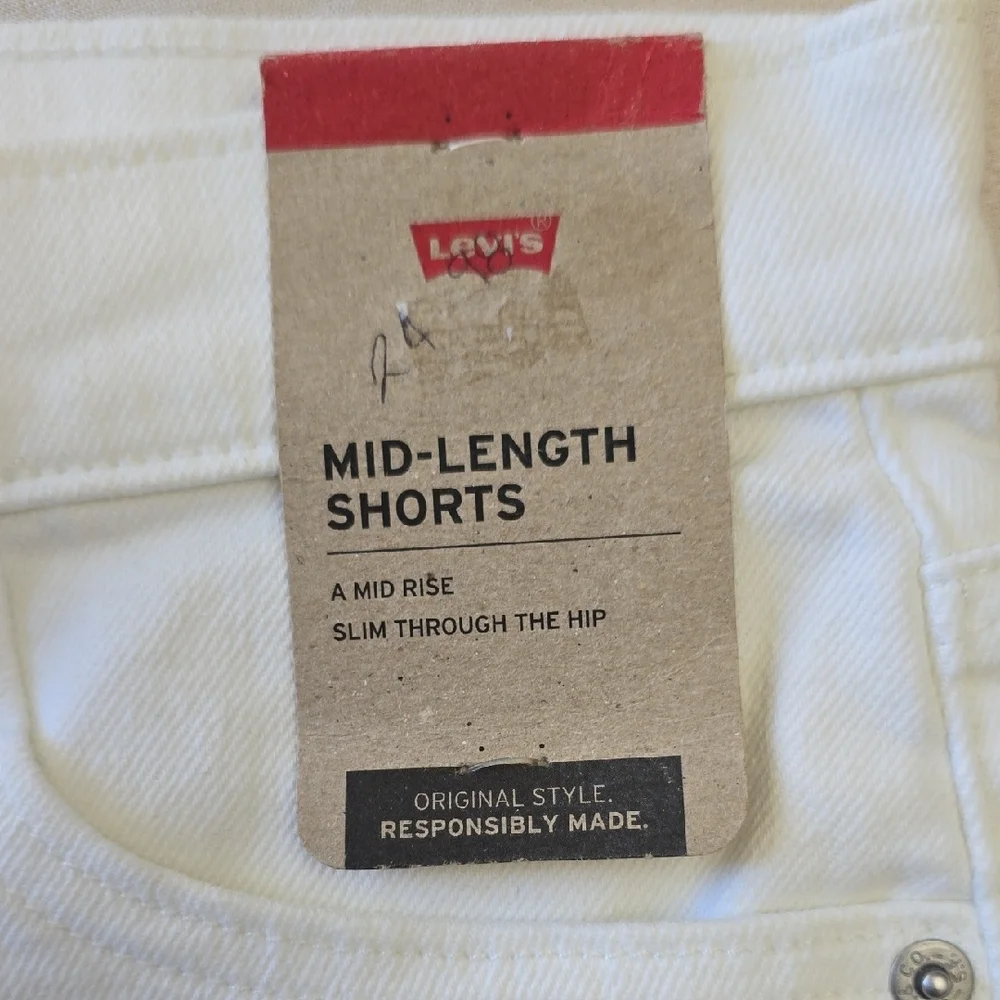 Levi's White Mid Rise Rolled-Hem Shorts & Distressed Blue Denim Cutoffs - Picture 4 of 9